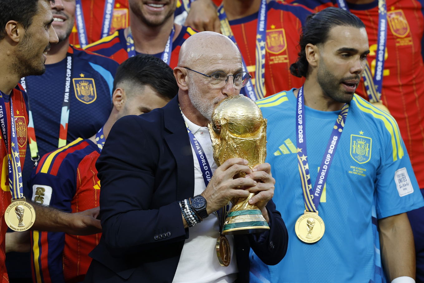 Spain manager Luis de la Fuente kisses the World Cup trophy after the FIFA World Cup 2026 final against Argentina at MetLife Stadium in East Rutherford
