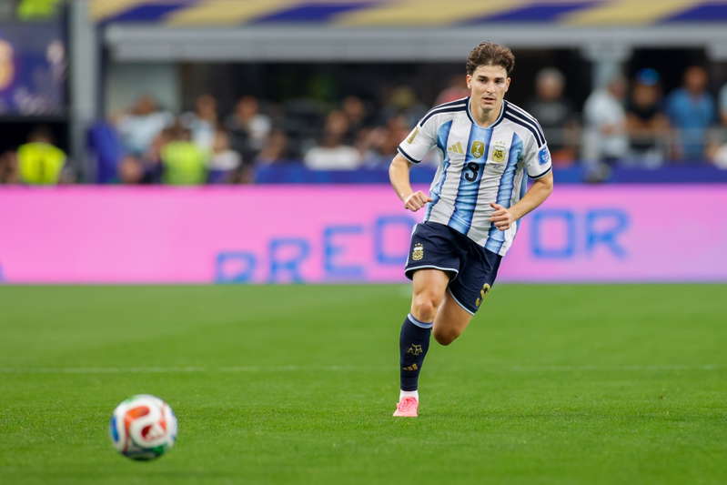 Argentina grind past Switzerland as Messi sets record and Alvarez settles it