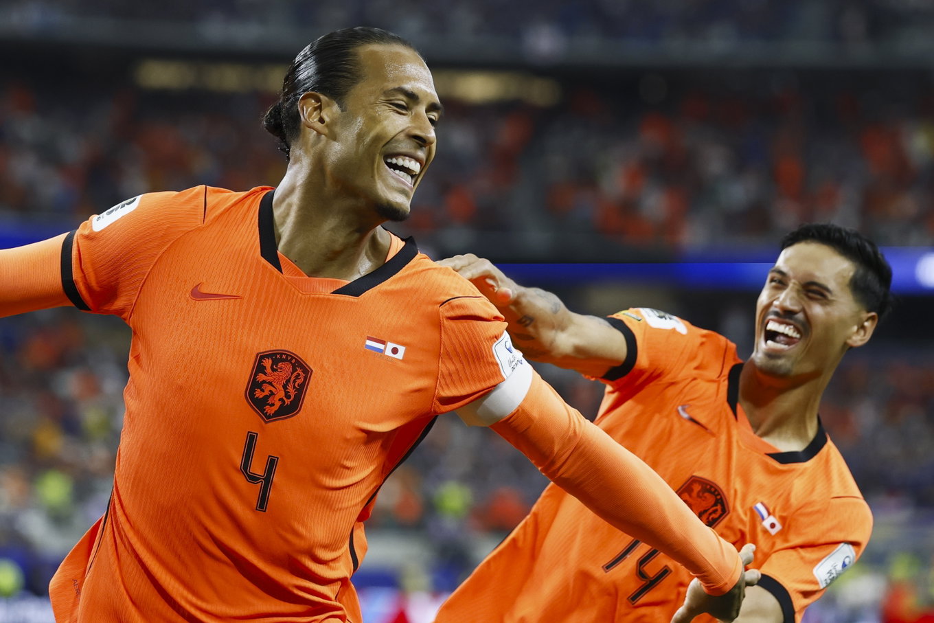 6/14/2026 - ARLINGTON - (lr) Virgil van Dijk of the Netherlands, Tijjani Reijnders of the Netherlands celebrate the 1-0 during the FIFA 2026 World Cup Group F match between the Netherlands and Japan at Dallas Stadium on June 14, 2026, in Arlington, United States.